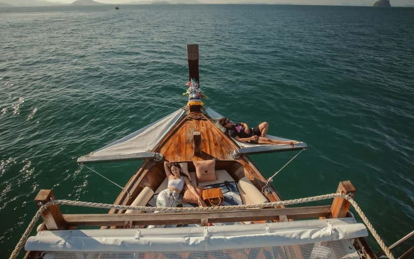 Krabi: 7 Island Tour by Luxury Longtail Boat with Snorkeling - Passing Railay Bay beneath the limestone cliffs