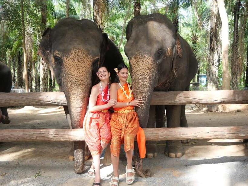 Krabi: Elephant Feeding Program with Traditional Thai Dress - Meeting the mahouts and choosing the elephant treats