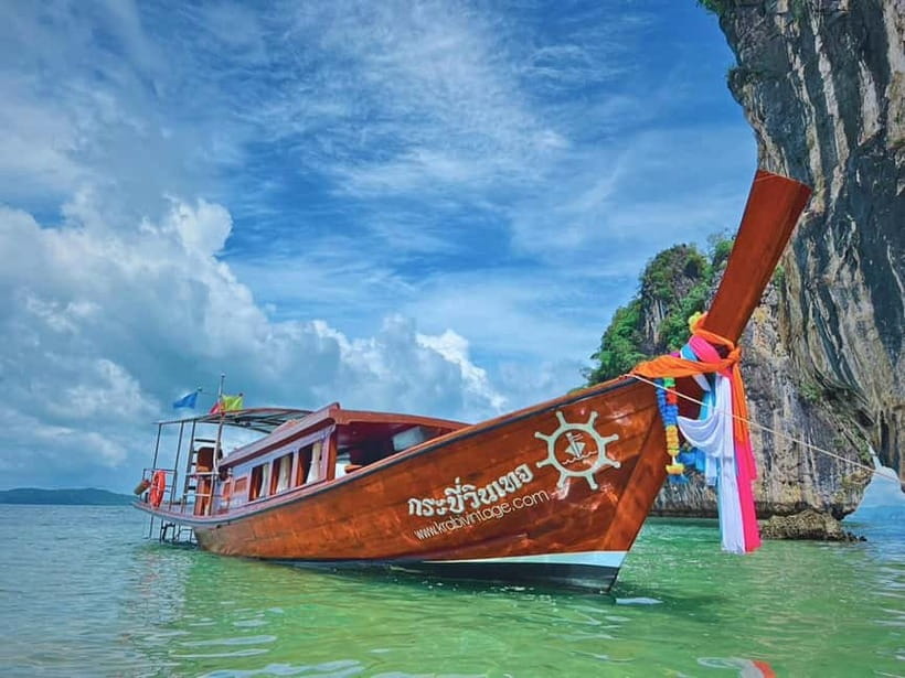 Krabi: Railay Phra Nang & Diamond Cave Sunset Plankton Tour - A boat ride into Krabi’s limestone coast
