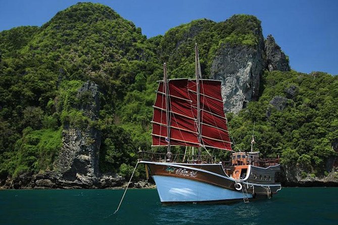 Krabi Romantic Sunset Cruise with BBQ Seafood Dinner by Krabi Sea Cruise - Chicken Rock brings the first swim