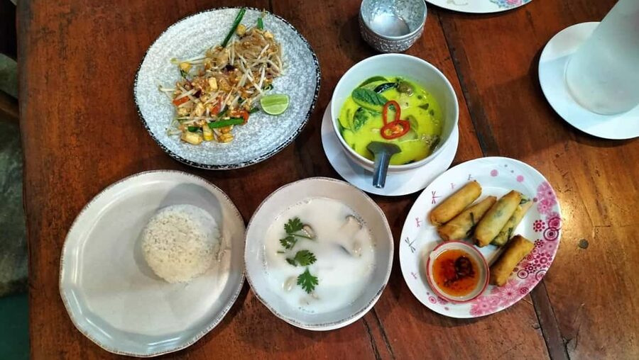 Krabi: Traditional Thai Cooking Class with Local Chef - Cooking, eating, and learning in stages